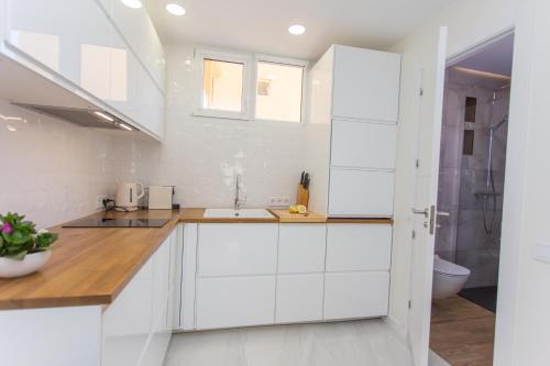 Η κουζίνα ή μικρή κουζίνα στο Dosel beach Apartment Cullera