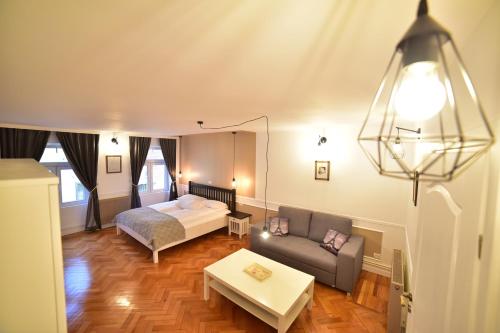 Llit o llits en una habitació de Maison Blanche