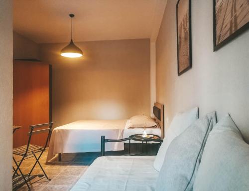 Postel nebo postele na pokoji v ubytování Arda Beachside Living