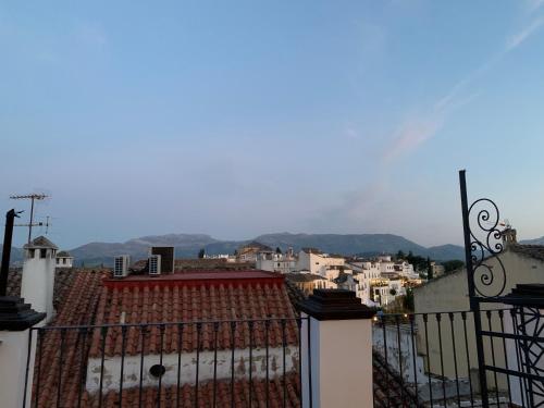 a view of a city from the roof of a building at Hotel Don Miguel in Ronda