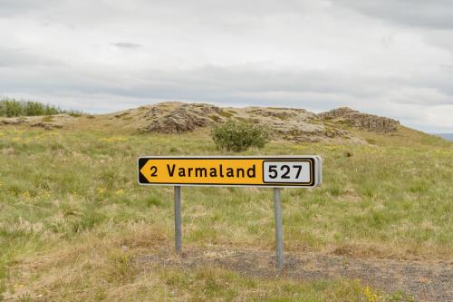 a sign that reads yarmald in a field at Varmaland Villa in Varmaland