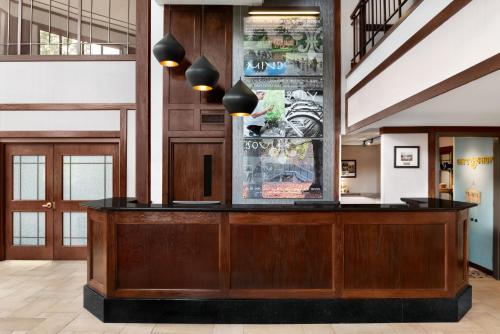 a lobby with a reception desk in a building at The Inn at Saint Mary's in South Bend