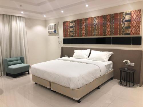 Katil atau katil-katil dalam bilik di Dar Al Maamon Furnished Apartment