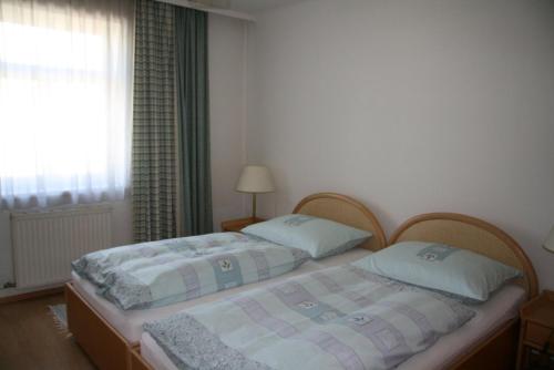 Cama o camas de una habitación en Apartments Wirrer