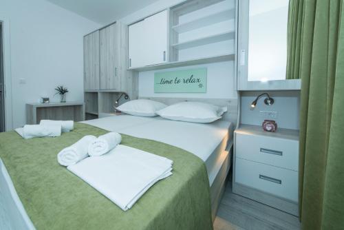 Katil atau katil-katil dalam bilik di Apartmani Spiline - Mia