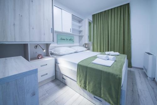 Katil atau katil-katil dalam bilik di Apartmani Spiline - Mia