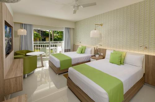 Postel nebo postele na pokoji v ubytování Grand Sirenis Punta Cana Resort & Aquagames - All Inclusive