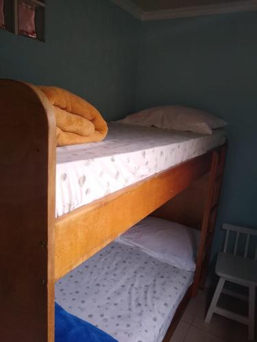 Hostel Dina & Suítesにあるベッド