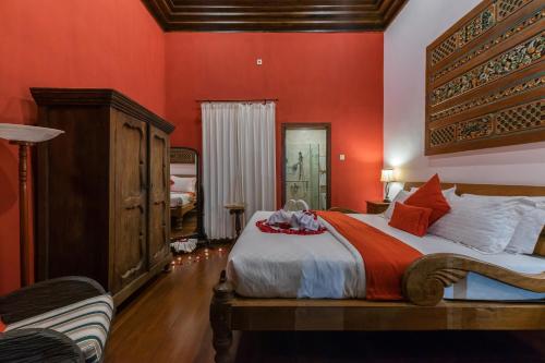 Katil atau katil-katil dalam bilik di Villa Mulyono