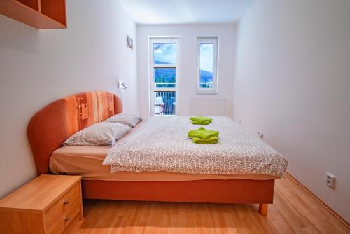 Postel nebo postele na pokoji v ubytování Horský Apartmán Klínovec 3