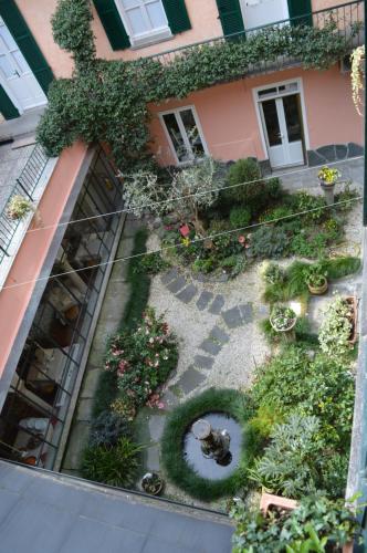 an aerial view of a garden in front of a building at Albergo Pesce D'oro in Verbania