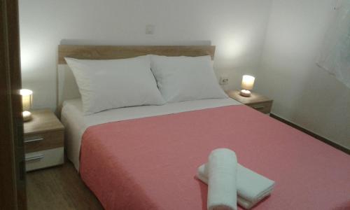 Postel nebo postele na pokoji v ubytování Apartman Krešo i Niko