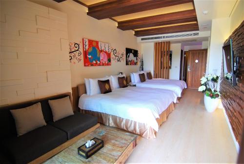 Giường trong phòng chung tại A&L Inn 戀灣旅棧