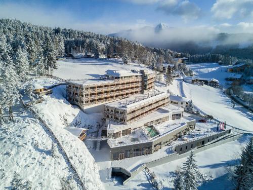 an aerial view of a building in the snow at NIDUM - Casual Luxury Hotel in Seefeld in Tirol