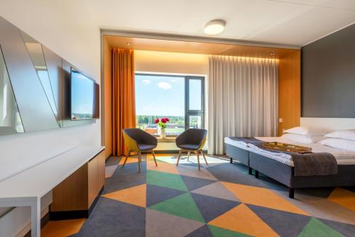 Postel nebo postele na pokoji v ubytování Hotel Sophia by Tartuhotels