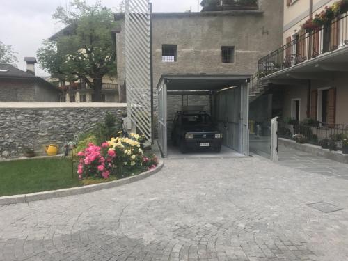 a car is parked inside of a garage at HOTEL AD Residence in Bormio