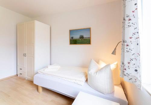 Katil atau katil-katil dalam bilik di Müritzparadies - Feriendorf Alte Fahrt