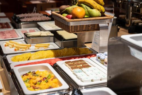 a buffet with a bunch of food on display at Catalonia Sabadell in Sabadell