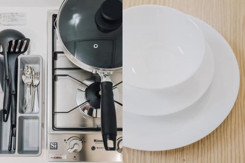 a kitchen appliance with a pot on top at AFP Tennoji Apartment in Osaka