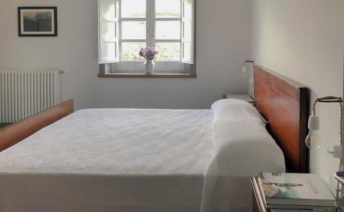 Un pat sau paturi într-o cameră la Casa Agricola Scorziello