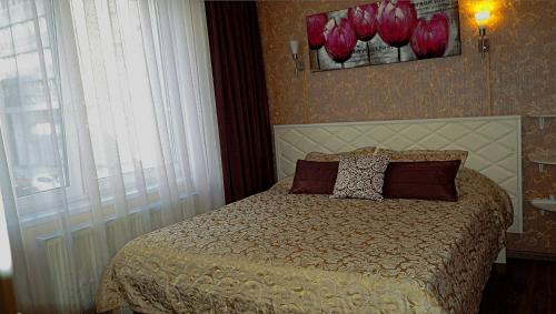 
Кровать или кровати в номере U Moskovskogo Vokzala Apartment
