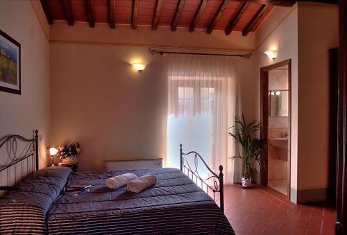 מיטה או מיטות בחדר ב-B&B Antica Trattoria Al Principe