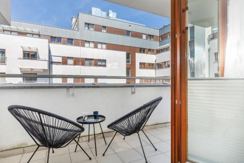 A balcony or terrace at Platan Apartments Świnoujście Center IV by Renters
