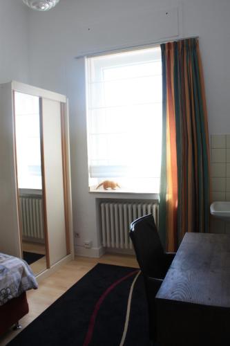 Postel nebo postele na pokoji v ubytování World House Wetten