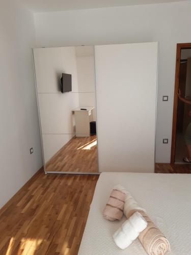 Postel nebo postele na pokoji v ubytování Apartmani Frano