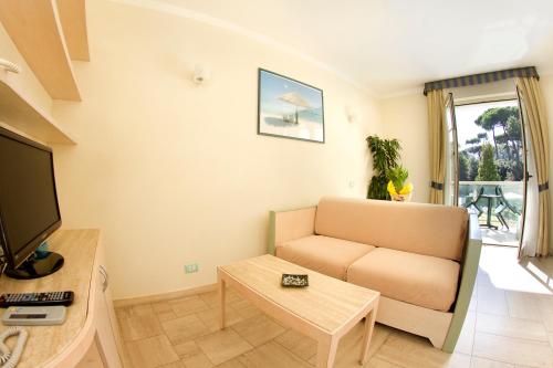 TV o dispositivi per l'intrattenimento presso Onda Marina Residence Rta