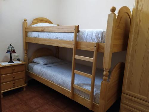 Poschodová posteľ alebo postele v izbe v ubytovaní Holiday Home LaCerca