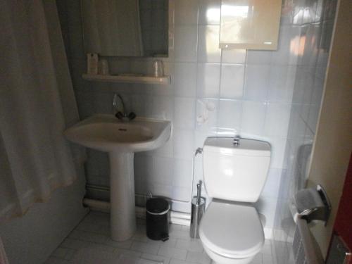 Koupelna v ubytování Hôtel Maya