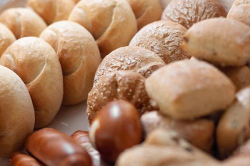 a pile of buns andnuts on a plate at Pension Gletscherblick in Fulpmes