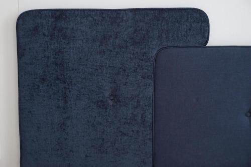 a black clipboard sitting on top of a table at Design Hotel Sophie´s in Norderney