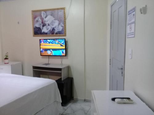 Hotel Itatiaiaにあるテレビまたはエンターテインメントセンター