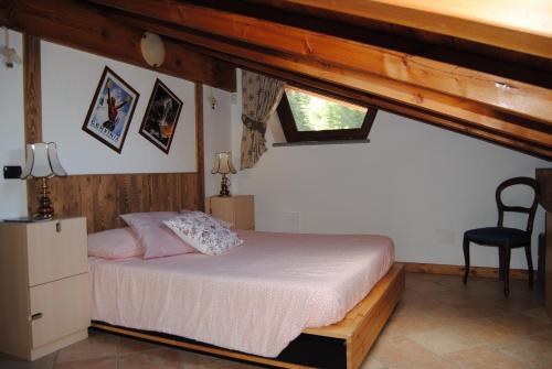 Postel nebo postele na pokoji v ubytování Appartamenti Paquier