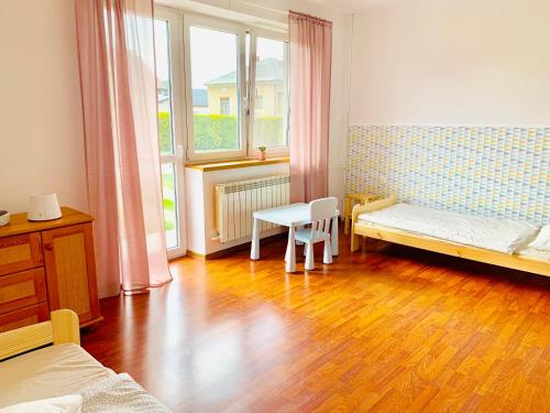 Posteľ alebo postele v izbe v ubytovaní Dom u Tosi pod Zatorem