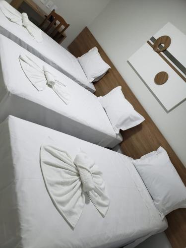 Katil atau katil-katil dalam bilik di Regional Plaza Hotel Event Park