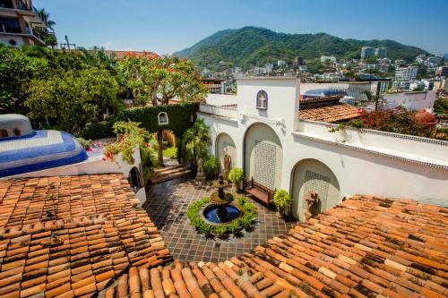 an aerial view of a building with a tile roof at Hacienda San Angel in Puerto Vallarta