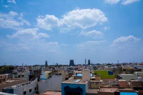 a view of a city from the roofs of buildings at Moskva Hotel in Madurai