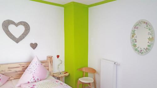 Ένα ή περισσότερα κρεβάτια σε δωμάτιο στο Ferienhaus am Traumpfad