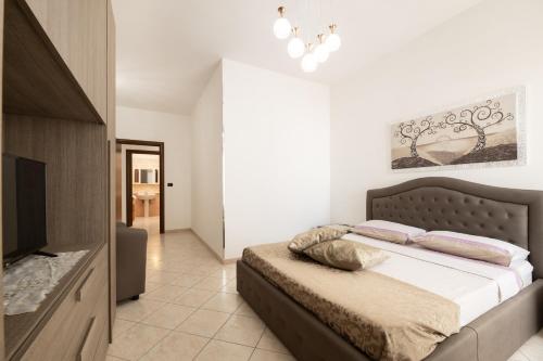 Ένα ή περισσότερα κρεβάτια σε δωμάτιο στο CASA VACANZA SALENTO MIREA