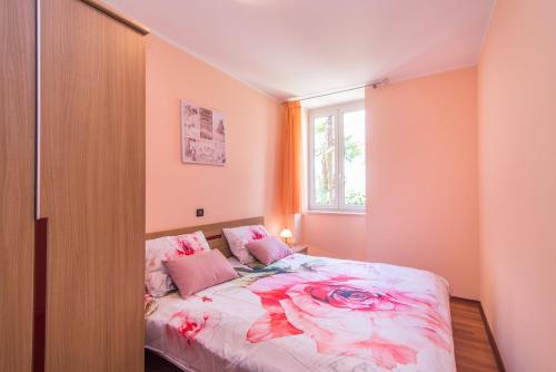 Кровать или кровати в номере Apartment Runko in Villa Emilia