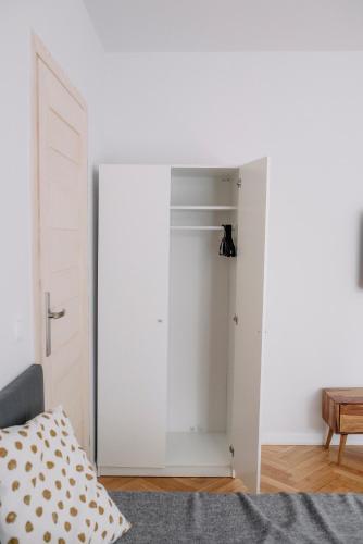 Postel nebo postele na pokoji v ubytování APARTEL Piaseczno