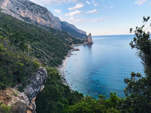 a view of the amalfi coast from a cliff at S'Imbragu Farm B&B in Tortolì