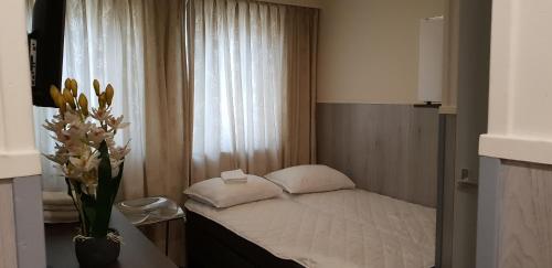 Apartment + Studios Insulinde – Photos 4