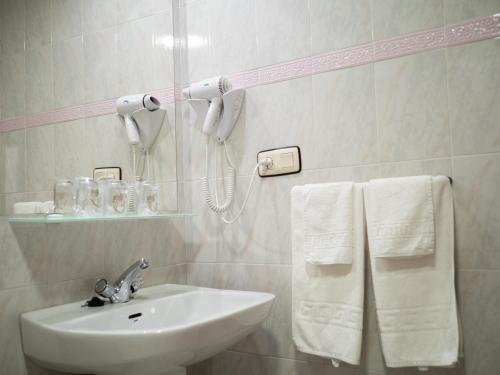 Koupelna v ubytování Hotel Quino