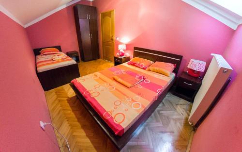 Ένα ή περισσότερα κρεβάτια σε δωμάτιο στο Apartmani Bellini
