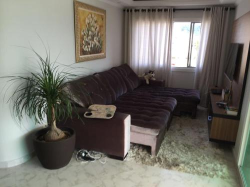 Ruang duduk di Cobertura de 3 quartos com hidromassagem e vista do por-do-sol