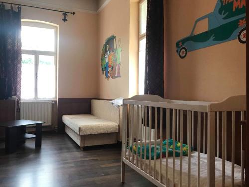 Posteľ alebo postele v izbe v ubytovaní Gyulai Meseház Apartman